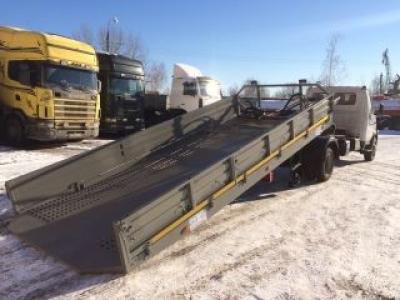Эвакуатор ГАЗ-33106 Валдай со сдвижной платформой и съемными откидными бортами