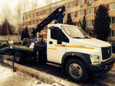 Эвакуатор ГАЗон NEXT с КМУ и ломаной платформой